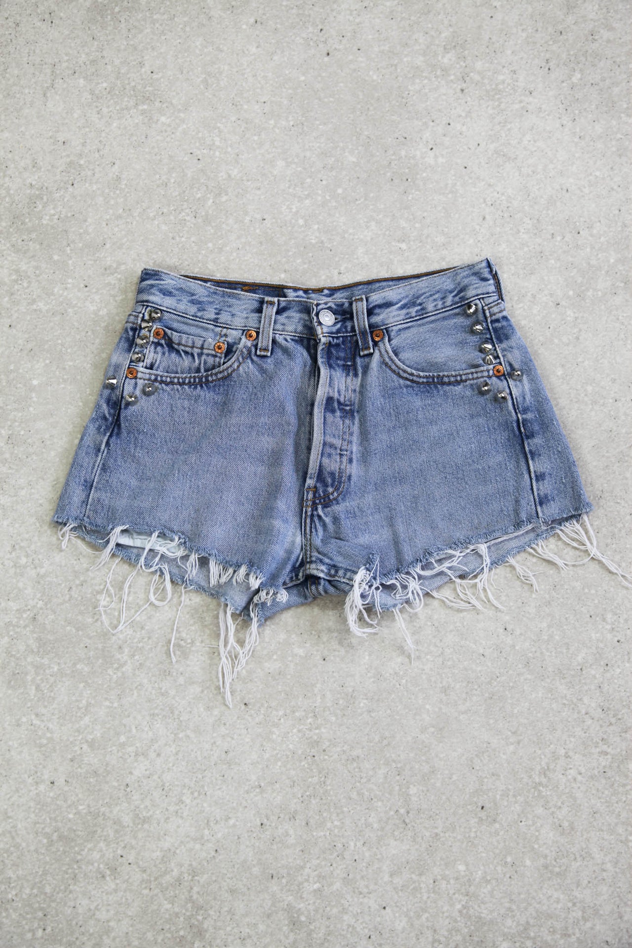Levi's Studded Cut Off Light Wash Denim Shorts (W25)